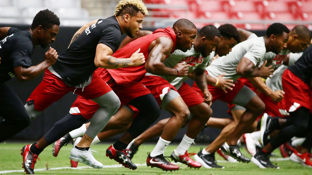 Cardinals open camp with 'healthy' Arians at the helm